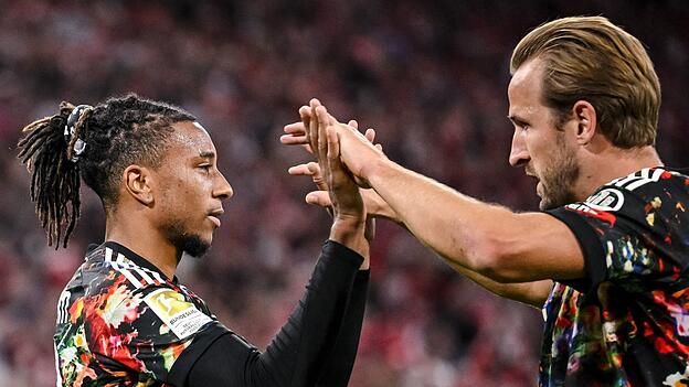 Zwei Bayern für große Auszeichnungen: Michael Olise (l) und Harry Kane. Zwei Bayern für große Auszeichnungen: Michael Olise (l) und Harry Kane.