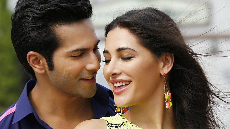 Die indischen Schauspieler Varun Dhawan (l) und Nargis Fakhri (r) in einer Szene der indischen Filmkomödie 'Main Tera Hero' aus dem Jahr 2014. Einer von Indiens größten TV-Konzernen startet einen Sender in Deutschland. Die indischen Schauspieler Varun Dhawan (l) und Nargis Fakhri (r) in einer Szene der indischen Filmkomödie 'Main Tera Hero' aus dem Jahr 2014. Einer von Indiens größten TV-Konzernen startet einen Sender in Deutschland.