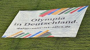 Mit einem großen Bann auf dem Olympiaberg wird für eine Münchner Sommerspiel-Bewerbung geworben. (Archivfoto) Mit einem großen Bann auf dem Olympiaberg wird für eine Münchner Sommerspiel-Bewerbung geworben. (Archivfoto)
